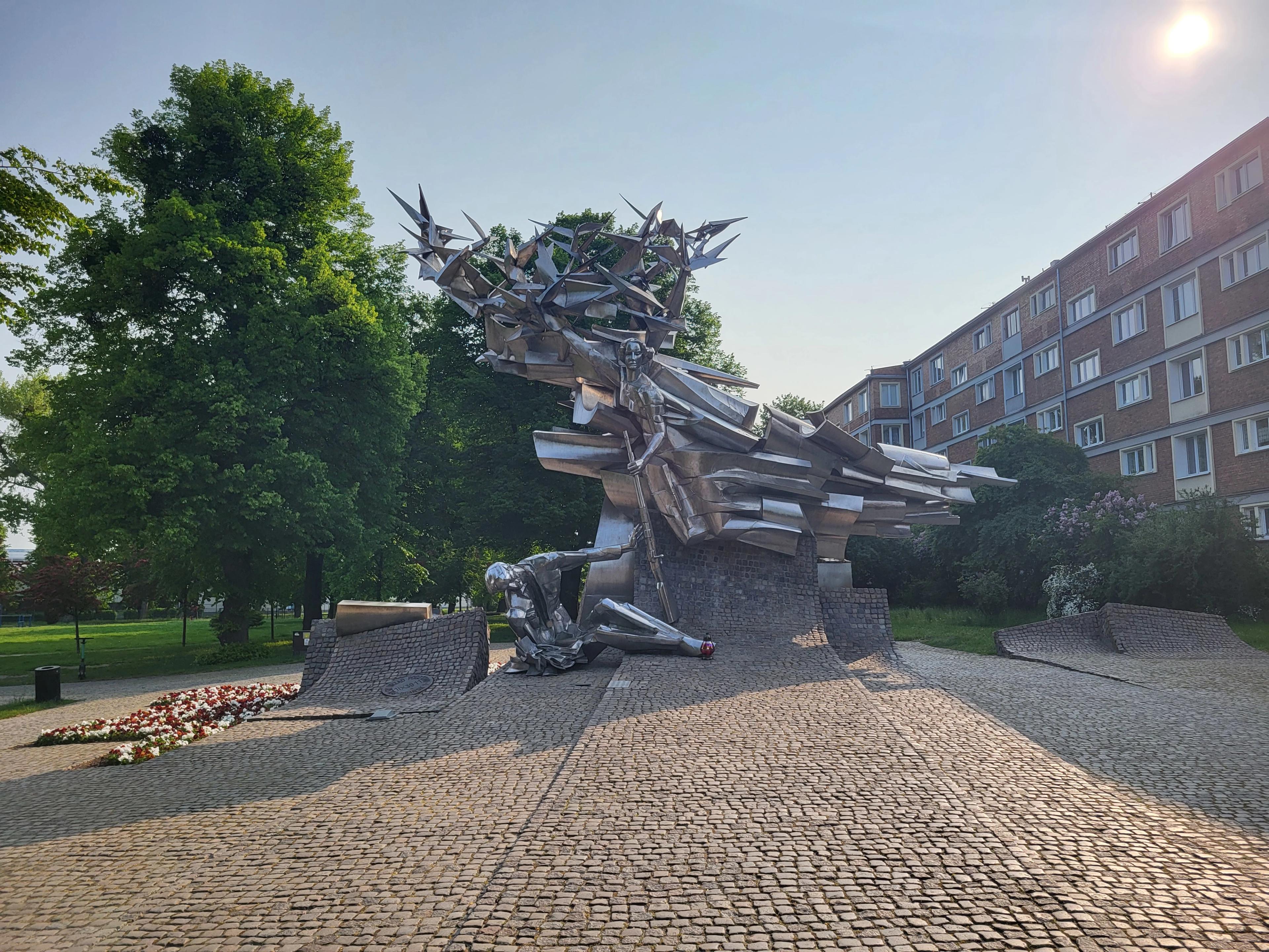 Monument to postal workers in front of the post office building