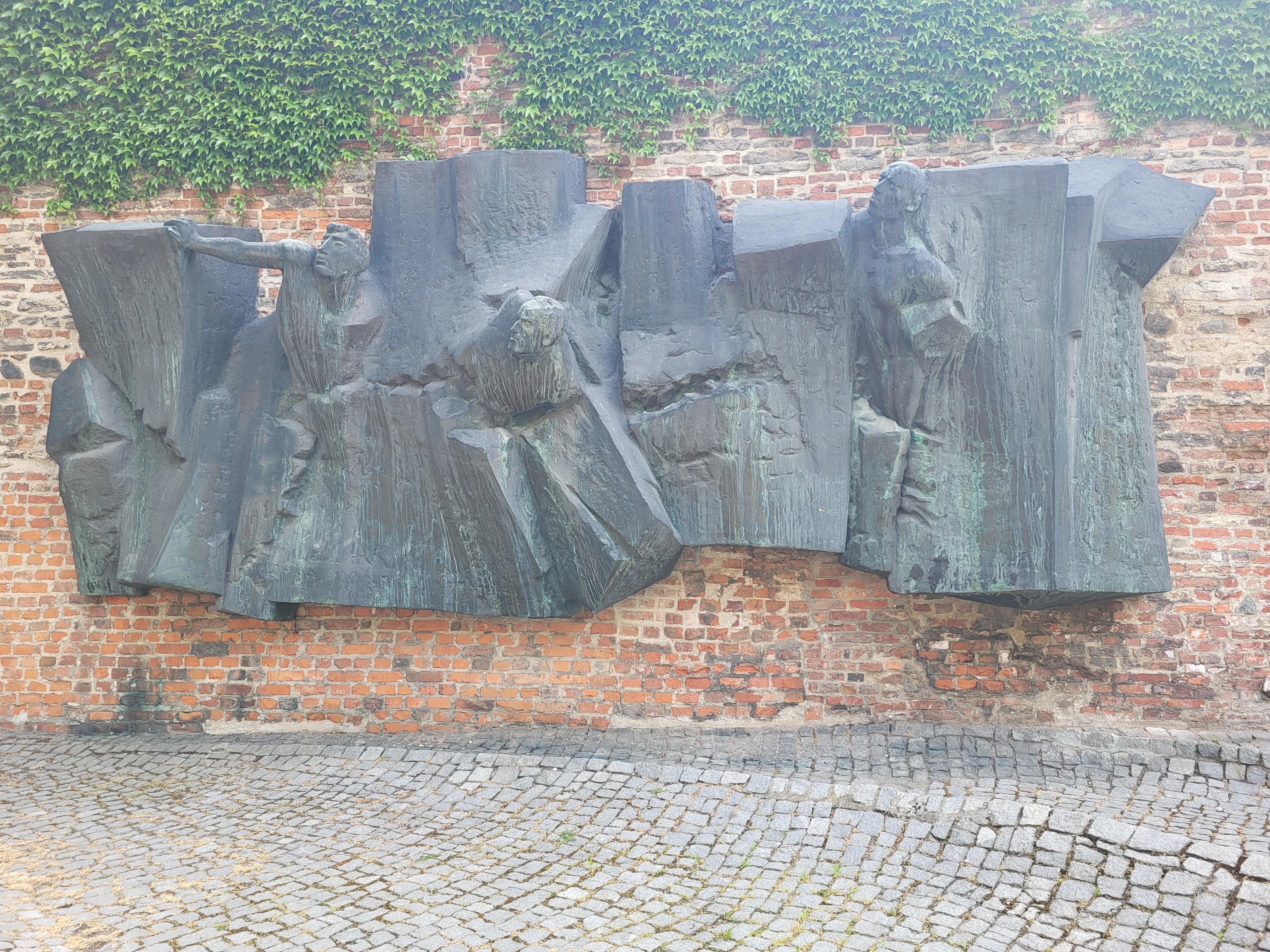 Postal workers monument on the wall with fingerprints