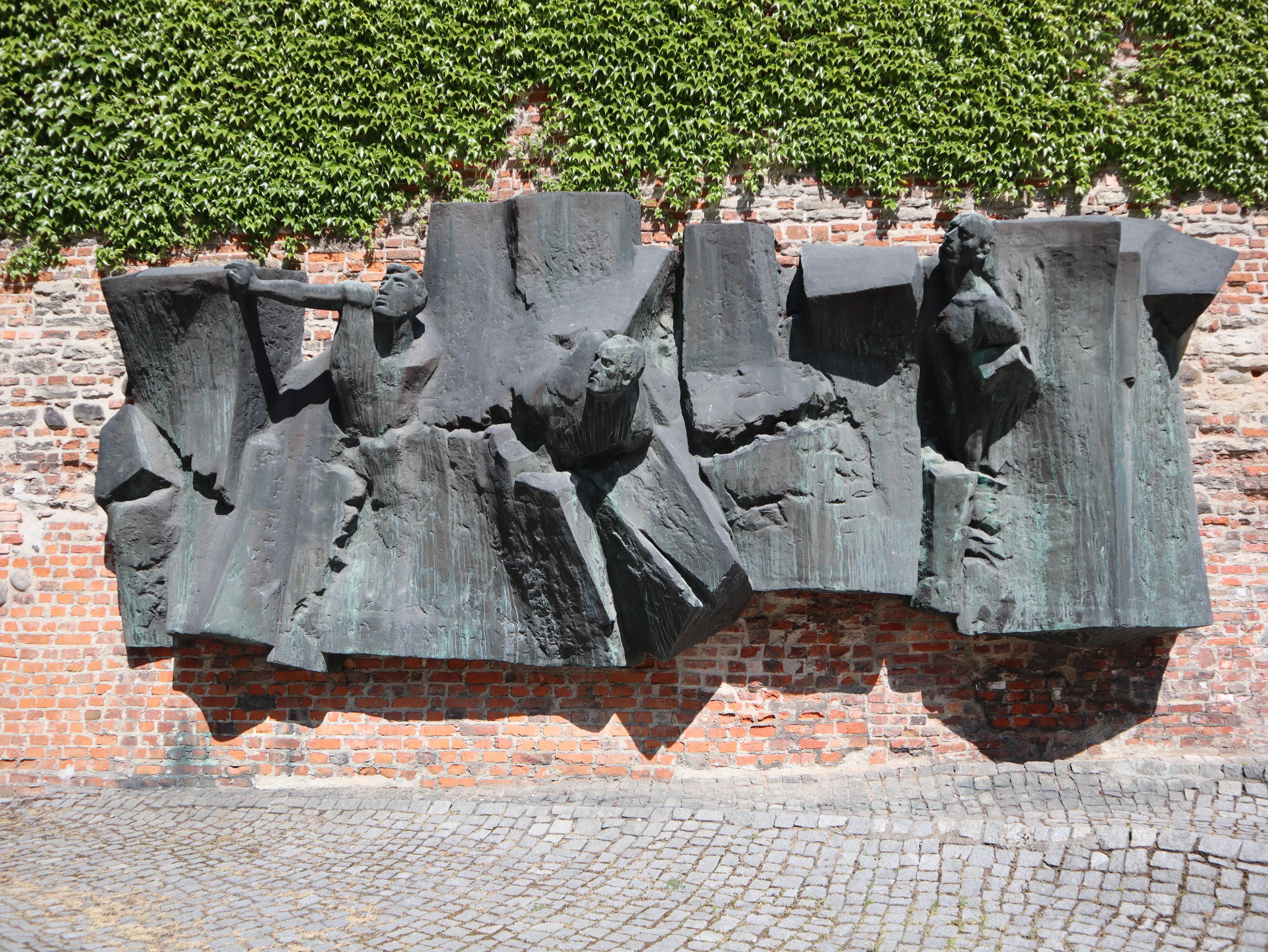 Postal workers monument on the wall with fingerprints