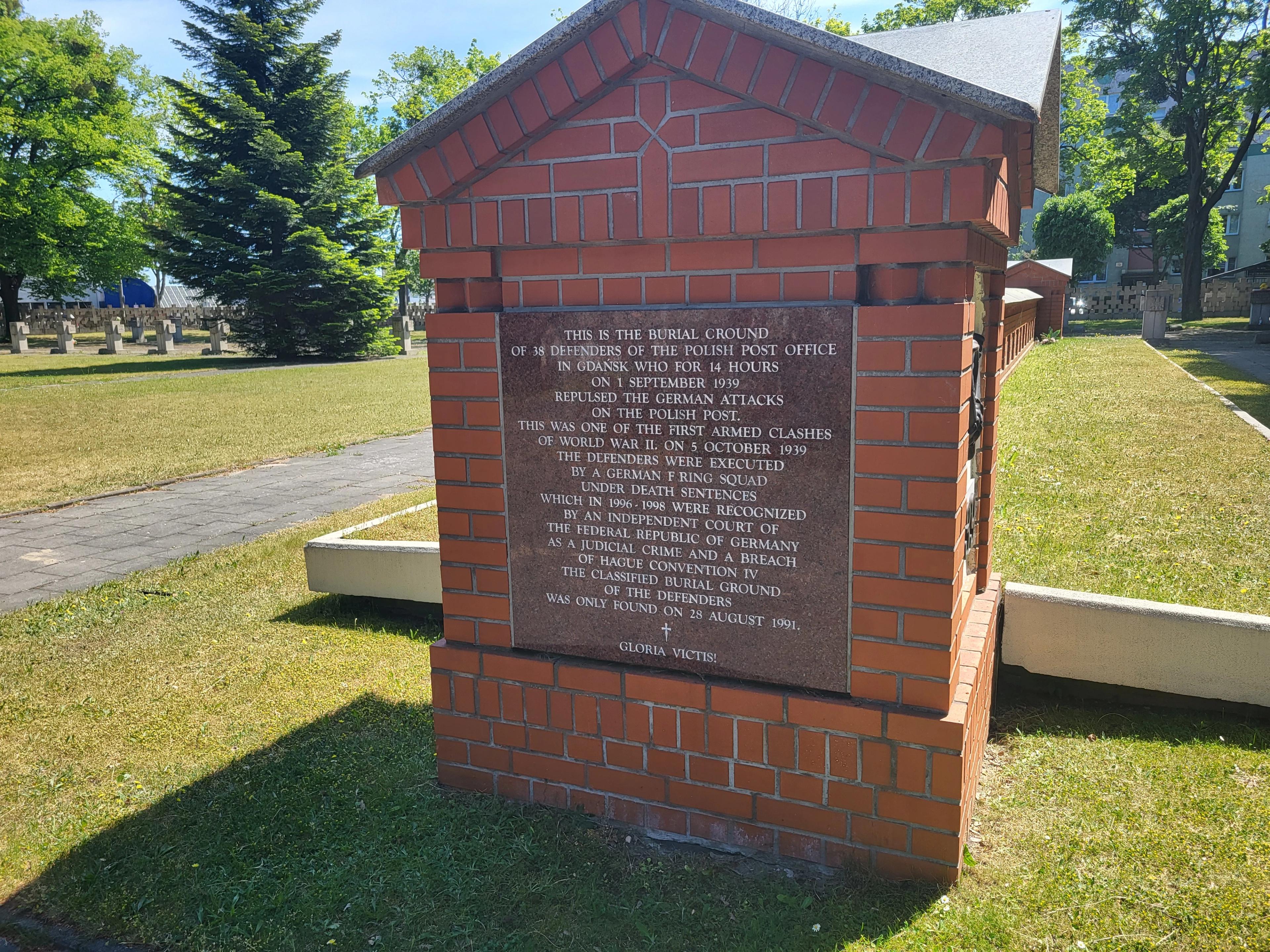 Grave of postal workers at the cemetery of victims of Nazism in Zaspa - plaque with inscription in english