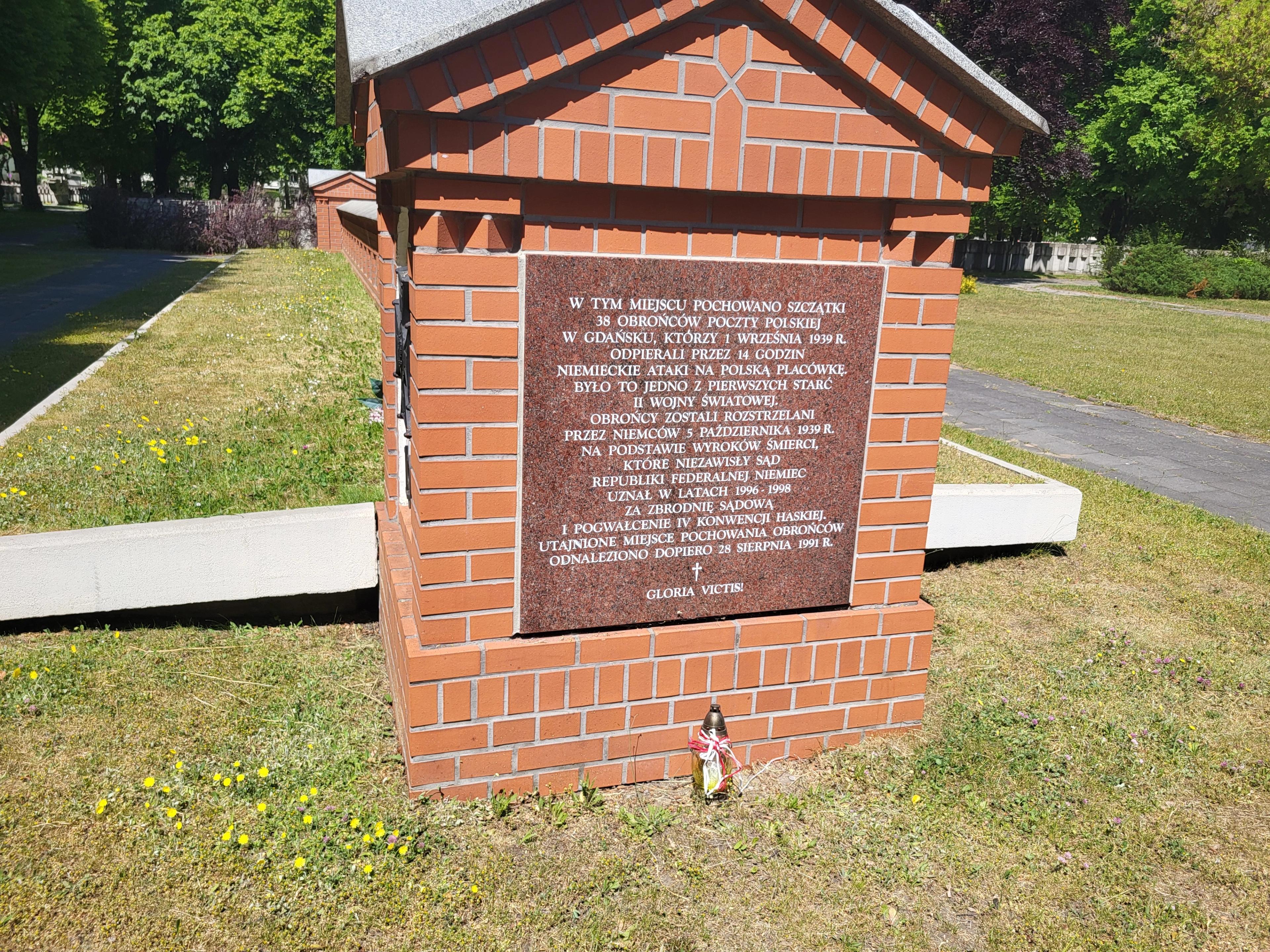 Grave of postal workers at the cemetery of victims of Nazism in Zaspa - plaque with inscription in polish