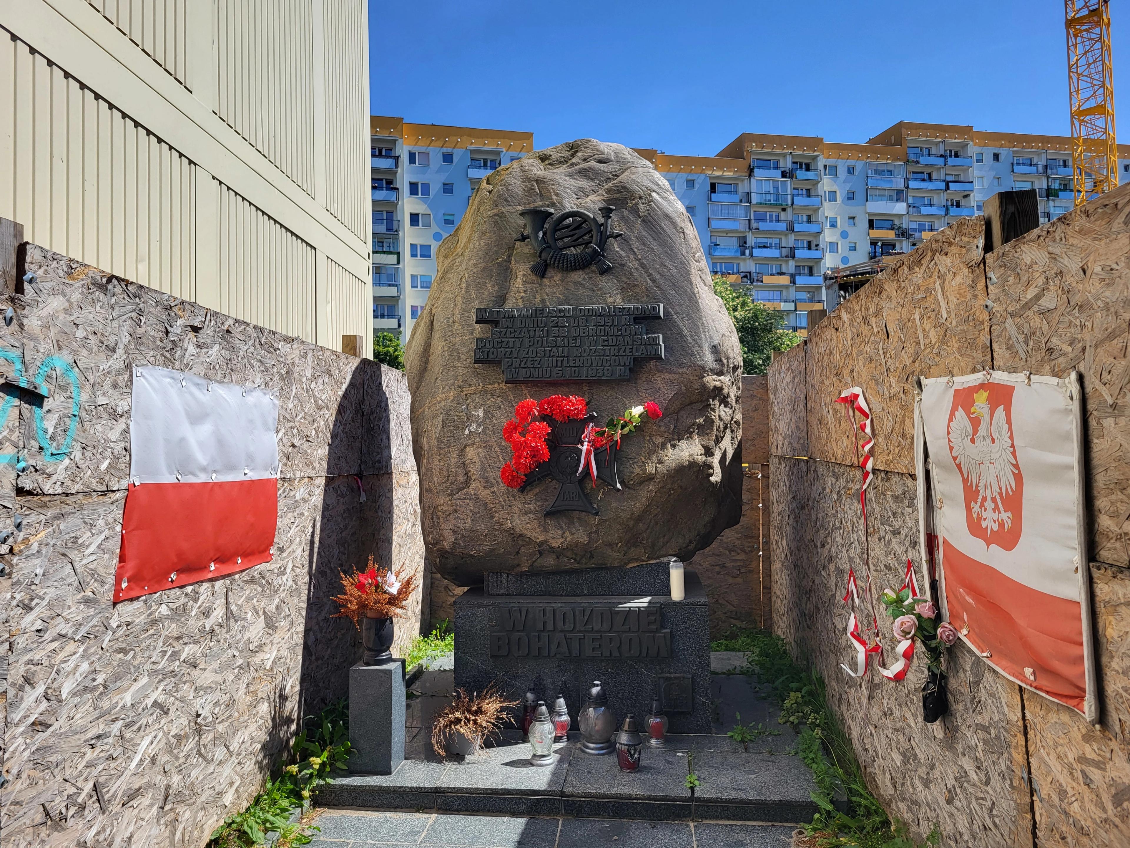 Memorial commemorating the site of the original burial of the defenders of Polish Post Office 1